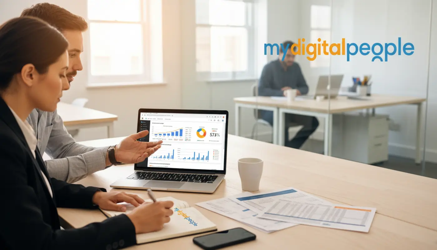 PPC consultant explaining Google Ads performance to client in a modern office setting